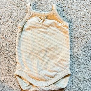 Quincy Mae Cream Sleeveless Baby One-Piece Bodysuit